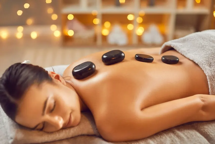 Hot stone massage on a woman's back